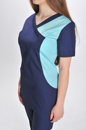 Медицинский костюм Марина+ Бр. зауженные. COTTON. Темно-синий с ментолом (отделка) (544706) фото 2